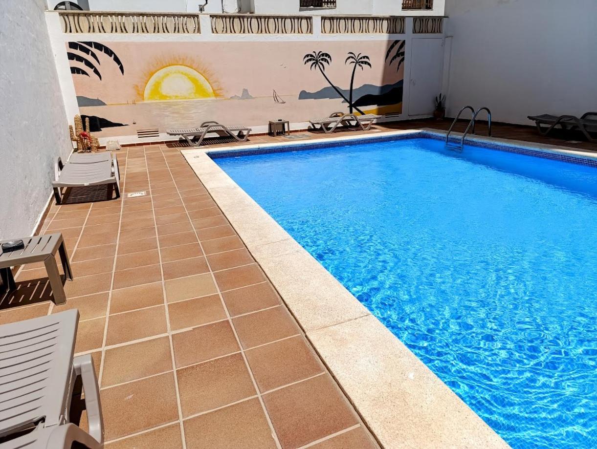 Hostal Horizonte San Antonio  Exterior photo A swimming pool