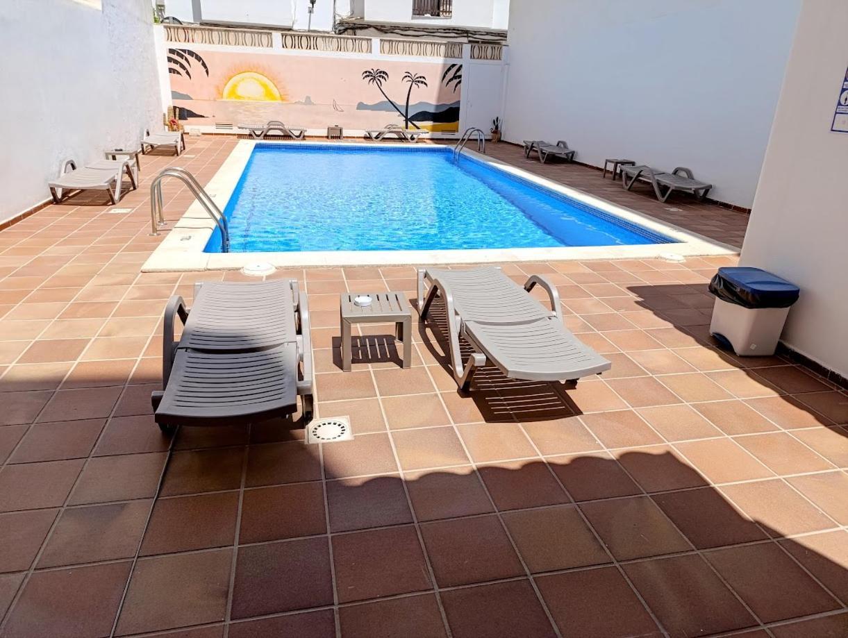 Hostal Horizonte San Antonio  Exterior photo A swimming pool