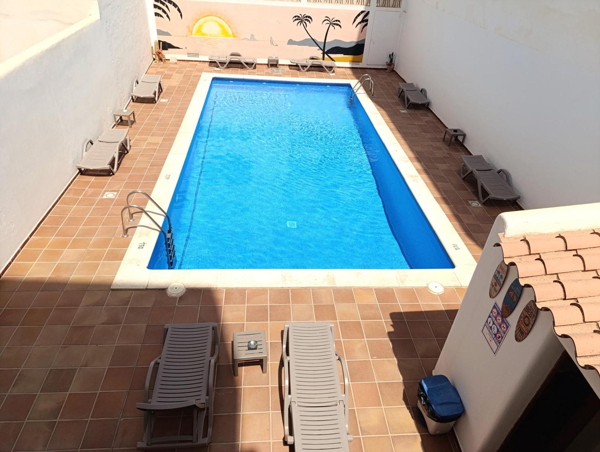 Hostal Horizonte San Antonio  Exterior photo A swimming pool