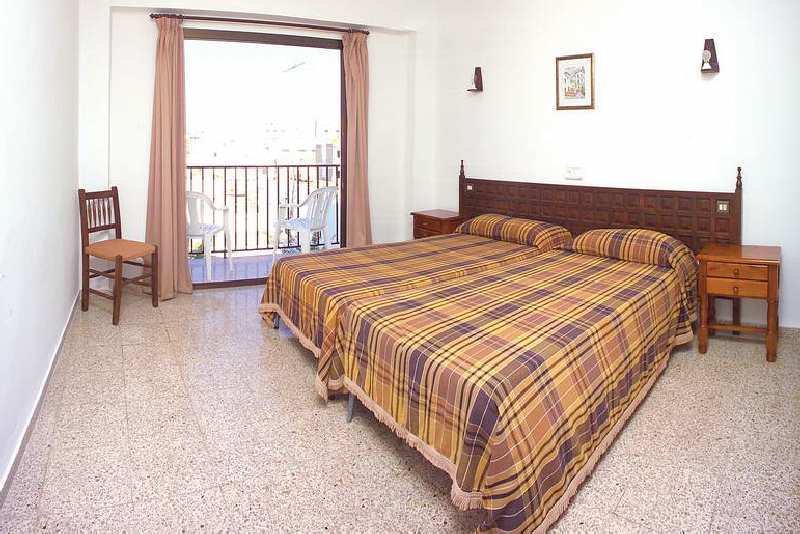 Hostal Horizonte San Antonio  Exterior photo A bedroom in a hotel